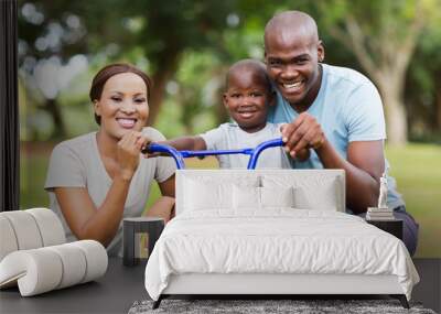 afro american family having fun together outdoors Wall mural