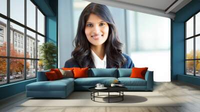 beautiful young indian businesswoman portrait in office Wall mural