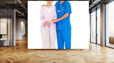 beautiful young nurse and senior woman isolated on white Wall mural