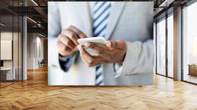 closeup african man using cell phone Wall mural