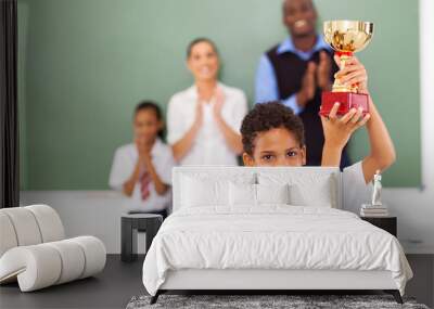 elementary school student holding a trophy Wall mural