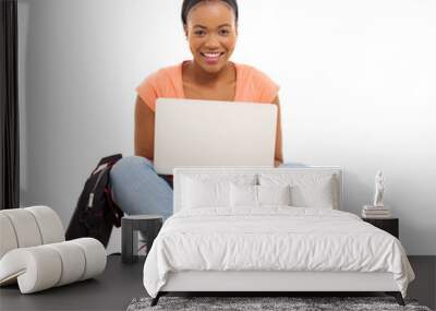 female african college student using laptop Wall mural