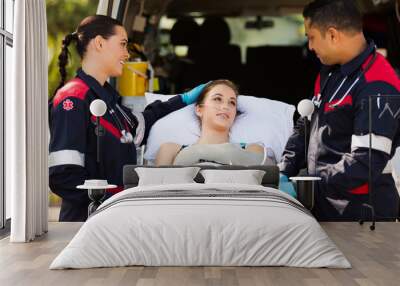 friendly paramedic comforting patient Wall mural