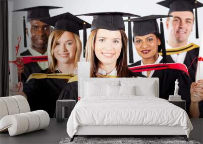 group of graduates in graduation gown and cap Wall mural