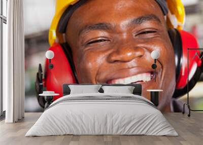 happy african american factory worker closeup portrait Wall mural