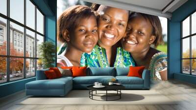 happy african mother and daughters Wall mural