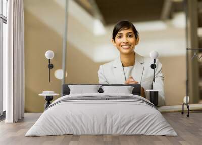 indian businesswoman portrait in office Wall mural