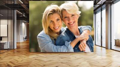 mother and daughter hugging Wall mural