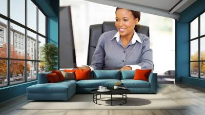 young african american businesswoman working on computer Wall mural