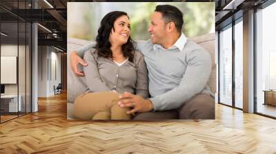 young couple looking at each other Wall mural