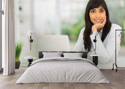 young indian businesswoman in office Wall mural