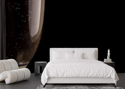 a glass of champagne on black background Wall mural