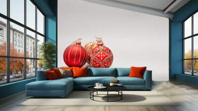 Christmas decoration, christmas ornaments - red and gold on gray background Wall mural