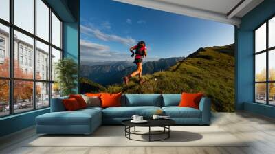 Sporty mountain woman rides in trail during endurance trail Wall mural