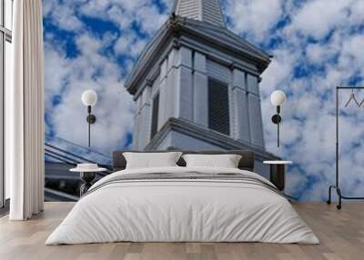 church steeple against blue sky Wall mural