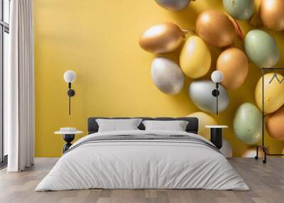 easter concept top view vertical photo of colorful easter eggs on isolated yellow background with em Wall mural