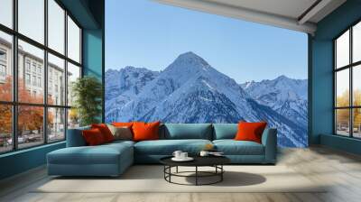 Mountain peaks textured and covered in melting snow - mountin ridges covered in snow Wall mural