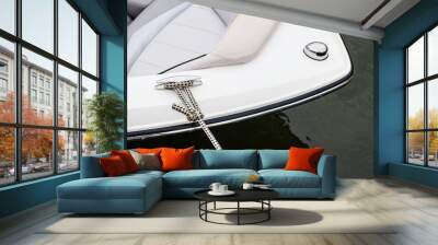 View of the bow of a moored motor boat on the dock hobby small yacht snow white luxury boat rental sports boat vacation leisure relaxation Wall mural