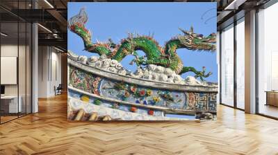 Colourful traditional dragon statue on the top of a Chinese temple Wall mural