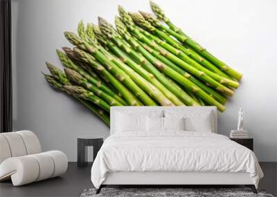 A bunch of fresh green asparagus spears arranged in a fan shape on a white background. The asparagus represents healthy eating, spring harvest, fresh produce, culinary ingredients, and vegetarian cuis Wall mural