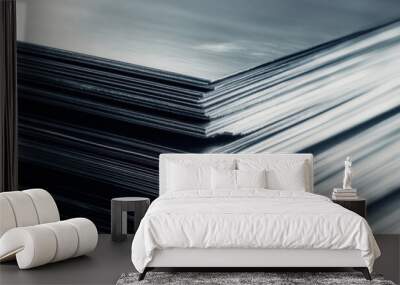 A close-up shot of a stack of silver metal sheets, showcasing the industrial nature of the material and its potential for construction or manufacturing. The image evokes themes of strength, durability Wall mural