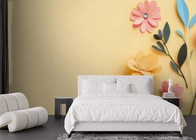 A delicate arrangement of paper flowers in pink, yellow and red, set against a soft yellow background.  The flowers symbolize  femininity, growth, and strength, making this a perfect greeting card for Wall mural