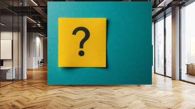 A yellow sticky note with a black question mark on a teal background. The image symbolizes uncertainty, inquiry, doubt, and seeking answers. Wall mural