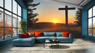 Cross Silhouette at Sunrise - A silhouette of a cross stands tall against a vibrant sunrise, symbolizing hope, faith, and renewal. The golden light bathes the landscape, creating a sense of peace and  Wall mural