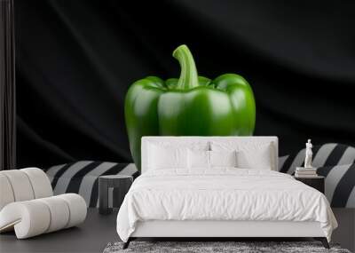 Fresh Green Bell Pepper on Striped Fabric - A single green bell pepper sits on a striped black and white fabric, representing freshness, health, and vibrant color. The dark background adds a dramatic  Wall mural