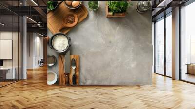 Top view of cooking ingredients on table - A culinary arrangement from above, displaying various cooking ingredients ready for meal preparation Wall mural