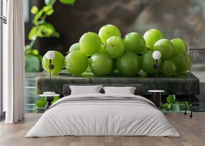 a bunch of green grapes on a marble surface.  Wall mural