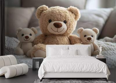 a teddy bear and two small teddy bears

 Wall mural