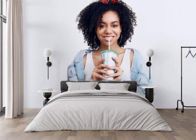 Glamor elegant black hippie teenage girl model with curly hair with soda Wall mural