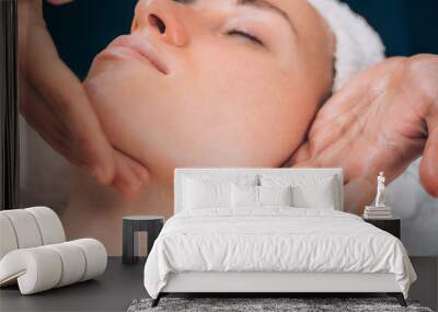 Massaging Face for Facial Fitness Wall mural