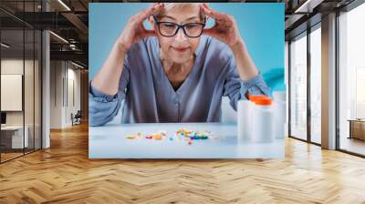 Senior patient failing to follow medical advice, demonstrating prescribed medicine non-adherence behavior. Wall mural