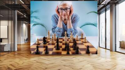 Senior Woman Playing Chess. Cognitive Rehabilitation Therapy. Wall mural