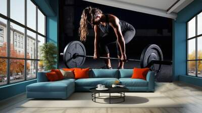 Woman weightlifting on training Wall mural