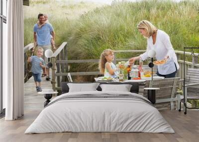 family on vacation eating outdoors Wall mural