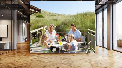 Family on vacation eating outdoors Wall mural