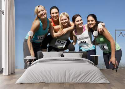 Five Female Runners Training For Race Wall mural