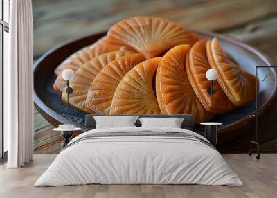  A sturdy wooden table featuring rich texture with cookies. Wall mural