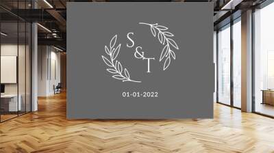 Initial letter ST monogram wedding logo with creative leaves decoration Wall mural