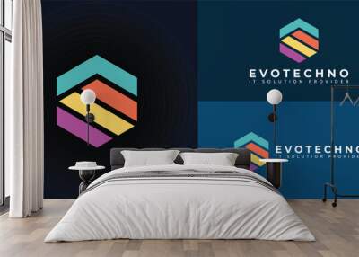 abstract initial letter ET or TE logo in a hexagon shape in blue, orange, yellow, and violet color isolated on multiple background colors. The logo is suitable for IT provider solution logo design Wall mural