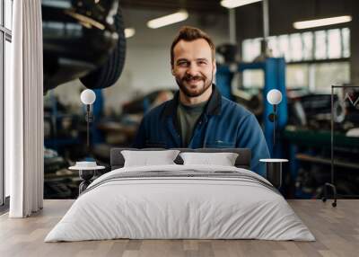 Photo of a mechanic man in a car repair shop Wall mural