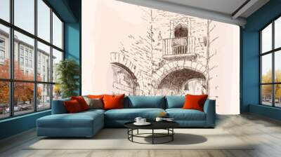 Street of the ancient city with stone houses and an arch. Wall mural