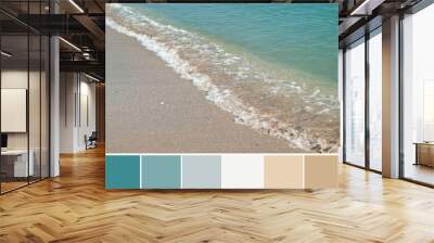 Colors of turquoise green sea water in combination with beige brown gamma of wet sand on sunny beach. Color palette swatches, fresh fashion trends in color combination inspired by natural beauty. Wall mural