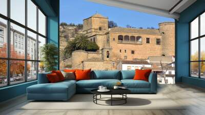 View of the Andalusian town of Canena with its famous castle, symbol of an excellent olive oil Wall mural