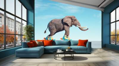 Elephant goes on rollers. Wall mural