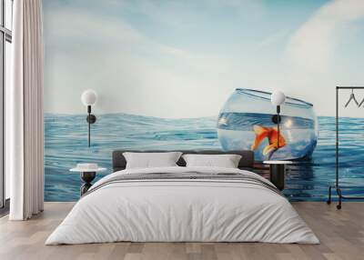 Golden fish in a bowl floating on sea. Wall mural