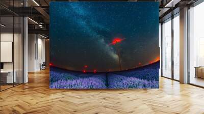 Beautiful starry night sky with milky way over a field of lavender and red lights of wind turbines, Bulgaria Wall mural